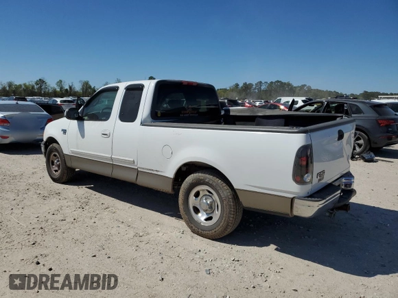 2002 Ford F-150 XL with VIN 1FTRX17W82NA64876, listed as a Copart auction lot 50013045 with 256,345 mi miles and Salvage Title. Bid and sale history available at carsss.com. Image 2.