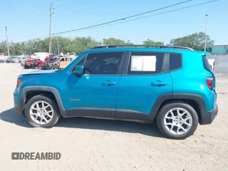 2020 Jeep Renegade Latitude with VIN ZACNJAB10LPM09870, listed as a IAAI auction lot 42063390 with 59,201 mi miles. Bid and sale history available at carsss.com. Image 14.