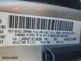 2010 Jeep Grand Cherokee Laredo with VIN 1J4RR4GT1AC106990, listed as a Copart auction lot 87421664 with 106,025 mi miles and Salvage Title. Bid and sale history available at carsss.com. Image 12.