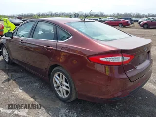2016 Ford Fusion SE with VIN 3FA6P0HD6GR253742, listed as a IAAI auction lot 41986812 with 115,522 mi miles. Bid and sale history available at carsss.com. Image 3.