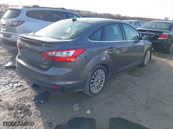 2012 Ford Focus Titanium with VIN 1FAHP3J2XCL421412, listed as a IAAI auction lot 41721565 with 117,632 mi miles. Bid and sale history available at carsss.com. Image 4.