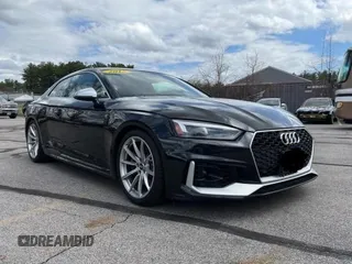 2018 Audi RS 5 z VIN WUAPWAF58JA903985, wystawiony jako Copart lot #49340143 z przebiegiem 74 299 mil mil oraz . Historia ofert i sprzedaży dostępna na DreamBid. Obrazek 1.