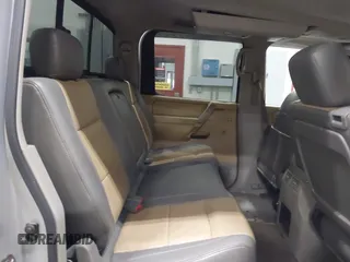 2004 Nissan Titan LE with VIN 1N6AA07B44N512889, listed as a IAAI auction lot 41569019 with 154,655 mi miles. Bid and sale history available at carsss.com. Image 8.