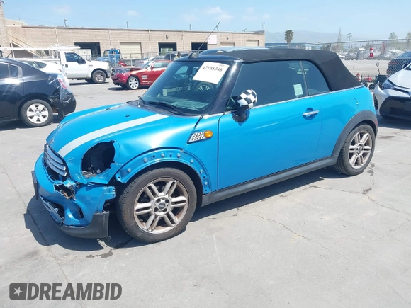 2014 MINI Convertible с VIN WMWZN3C55ET569656, выставлен на аукционе IAAI как лот 42105348 с пробегом 87 671 миль миль и . История ставок и продаж доступна на DreamBid. Изображение 18.