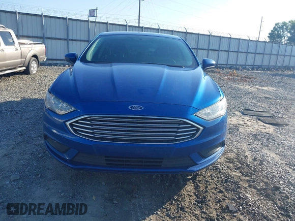 2018 Ford Fusion SE z VIN 3FA6P0H7XJR106776, wystawiony jako IAAI lot #42243361 z przebiegiem 174 000 mil mil oraz . Historia ofert i sprzedaży dostępna na DreamBid. Obrazek 12.