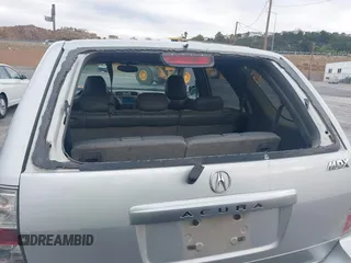 2006 Acura MDX with VIN 2HNYD18216H514134, listed as a IAAI auction lot 41233105 with 144,326 mi miles. Bid and sale history available at carsss.com. Image 6.