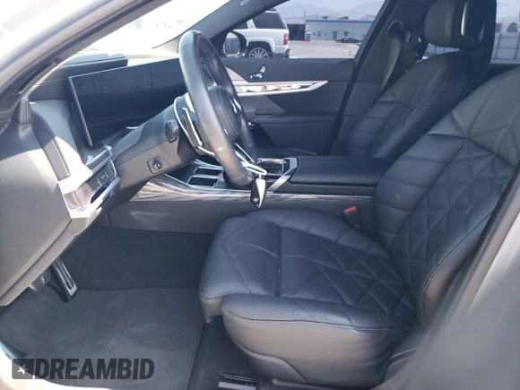 2023 BMW 7 Series 740i with VIN WBA23EH09PCM67327, listed as a Copart auction lot 73387174 with 18,228 mi miles and Salvage Title. Bid and sale history available at carsss.com. Image 7.
