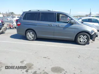 2007 Honda Odyssey EX-L с VIN 5FNRL386X7B421678, выставлен на аукционе IAAI как лот 41863509 с пробегом 190 969 миль миль и . История ставок и продаж доступна на DreamBid. Изображение 13.