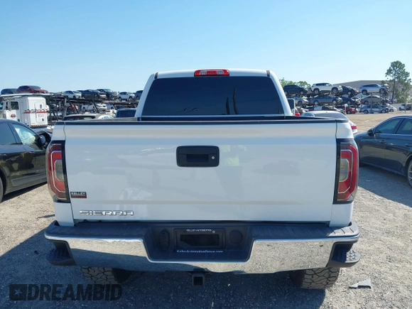 2017 GMC Sierra 1500 SLT z VIN 3GTU2NEC2HG474079, wystawiony jako IAAI lot #41899673 z przebiegiem 104 033 mil mil oraz . Historia ofert i sprzedaży dostępna na DreamBid. Obrazek 16.