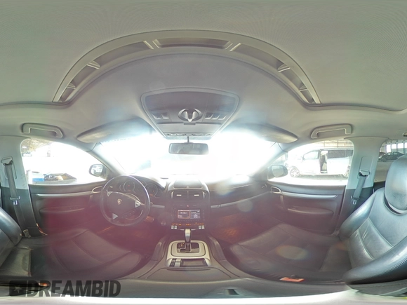2006 Porsche Cayenne S with VIN WP1AB29P56LA66639, listed as a Copart auction lot 52097595 with 180,827 mi miles and Salvage title. Bid and sale history available at DreamBid. Image 12.