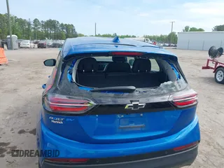 2023 Chevrolet Bolt EV 2LT z VIN 1G1FX6S05P4128607, wystawiony jako IAAI lot #42081752 z przebiegiem 22 551 mil mil oraz . Historia ofert i sprzedaży dostępna na DreamBid. Obrazek 6.