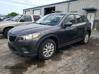 2014 Mazda CX-5 Sport with VIN JM3KE2BE9E0372370, listed as a Copart auction lot 58980165 with 175,477 mi miles and Salvage title. Bid and sale history available at DreamBid. Image 1.