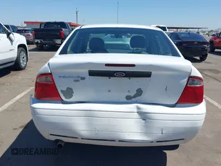 2007 Ford Focus S with VIN 1FAFP34N57W106082, listed as a IAAI auction lot 42594888 with 279,965 mi miles and . Bid and sale history available at DreamBid. Image 6.