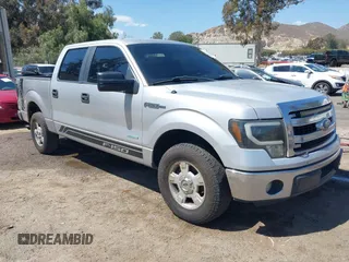 2014 Ford F-150 XL with VIN 1FTFW1CT3EKD12216, listed as a IAAI auction lot 42110775 with 140,673 mi miles. Bid and sale history available at carsss.com. Image 1.