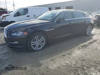 2016 Jaguar XJ Portfolio with VIN SAJWJ2GDXG8W03143, listed as a Copart auction lot 86467114 with 42,923 mi miles and Salvage Title. Bid and sale history available at DreamBid. Image 1.
