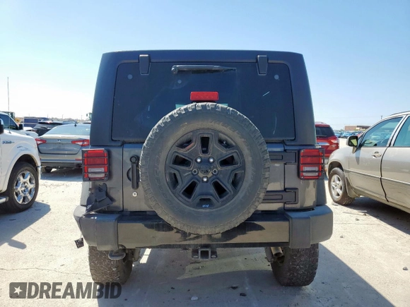 2014 Jeep Wrangler Unlimited Sport with VIN 1C4BJWDG2EL294829, listed as a Copart auction lot 51921685 with 138,203 mi miles and Salvage Title. Bid and sale history available at DreamBid. Image 6.