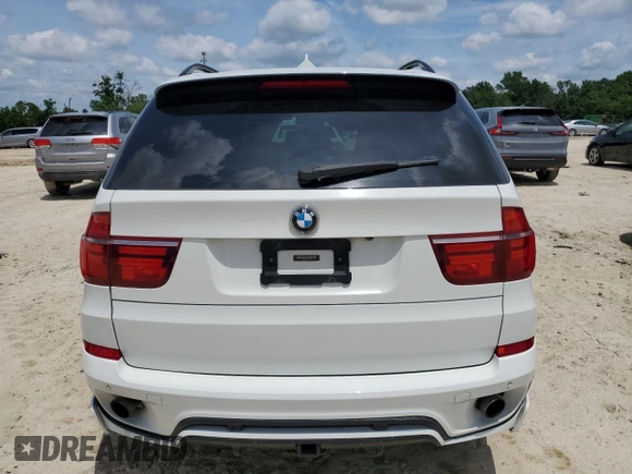 2012 BMW X5 35i с VIN 5UXZV4C58CL987049, выставлен на аукционе Copart как лот 61013925 с пробегом 167 508 миль миль и Чистый • Clean title. История ставок и продаж доступна на DreamBid. Изображение 6.