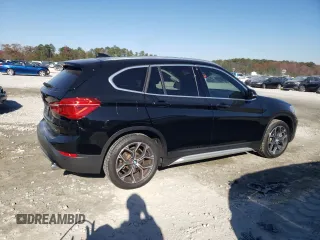 2022 BMW X1 sDrive28i with VIN WBXJG7C03N5V16273, listed as a Copart auction lot 83842324 with 19,303 mi miles and Salvage Title. Bid and sale history available at carsss.com. Image 3.