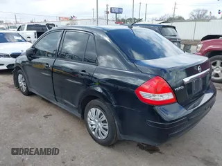 2009 Nissan Versa 1.8 S with VIN 3N1BC11E09L450167, listed as a IAAI auction lot 41711284 with 91,216 mi miles. Bid and sale history available at carsss.com. Image 3.