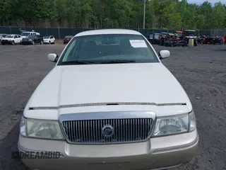 2004 Mercury Grand Marquis LS Premium z VIN 2MEFM75W04X678032, wystawiony jako IAAI lot #42341419 z przebiegiem 114 502 mil mil oraz . Historia ofert i sprzedaży dostępna na DreamBid. Obrazek 6.