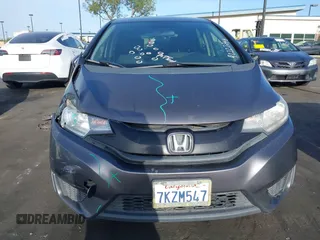 2015 Honda Fit LX z VIN 3HGGK5H51FM774707, wystawiony jako IAAI lot #42228746 z przebiegiem 238 489 mil mil oraz . Historia ofert i sprzedaży dostępna na DreamBid. Obrazek 13.