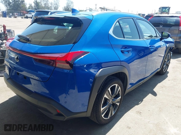 2022 Lexus UX with VIN JTHX3JBH0N2049742, listed as a IAAI auction lot 41917341 with 18,728 mi miles. Bid and sale history available at carsss.com. Image 4.