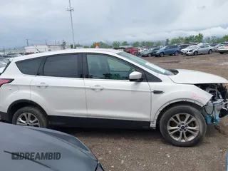 2017 Ford Escape SE with VIN 1FMCU0GD7HUC76041, listed as a IAAI auction lot 42187884 with 176,566 mi miles and . Bid and sale history available at DreamBid. Image 14.