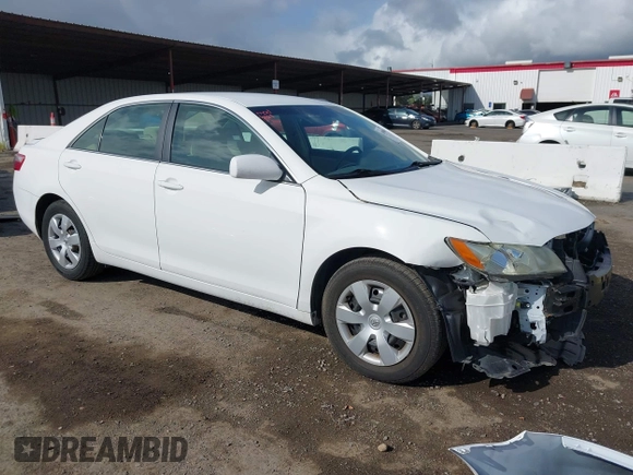 2009 Toyota Camry with VIN 4T1BE46K69U913065, listed as a IAAI auction lot 41906304 with 153,018 mi miles. Bid and sale history available at carsss.com. Image 1.