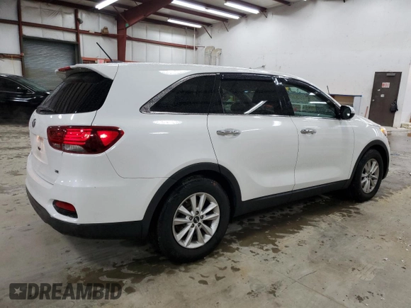 2019 Kia Sorento LX z VIN 5XYPG4A56KG558427, wystawiony jako Copart lot #51971055 z przebiegiem 103 523 mil mil oraz Szkoda całkowita • Salvage title. Historia ofert i sprzedaży dostępna na DreamBid. Obrazek 3.