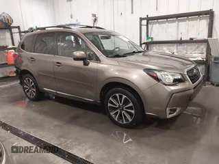 2017 Subaru Forester Touring with VIN JF2SJGTC4HH558808, listed as a IAAI auction lot 41565049 with 79,713 mi miles. Bid and sale history available at carsss.com. Image 1.