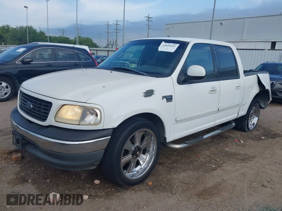 2001 Ford F-150 XLT with VIN 1FTRW07L81KE91672, listed as a IAAI auction lot 42021661 with 200,000 mi miles and . Bid and sale history available at DreamBid. Image 19.