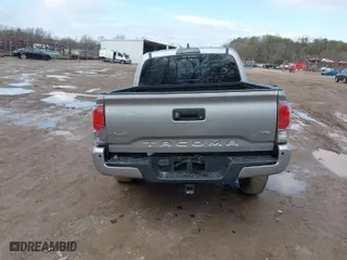 2019 Toyota Tacoma 4WD SR with VIN 3TMGZ5AN8KM259475, listed as a IAAI auction lot 41569810 with 61,405 mi miles. Bid and sale history available at carsss.com. Image 16.