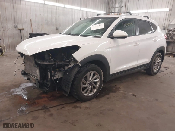2016 Hyundai Tucson SE with VIN KM8J33A48GU117807, listed as a IAAI auction lot 41642891 with 142,371 mi miles. Bid and sale history available at carsss.com. Image 18.