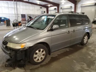 2002 Honda Odyssey EX-L with VIN 2HKRL18932H553691, listed as a Copart auction lot 60477625 with 150,085 mi miles and Salvage title. Bid and sale history available at DreamBid. Image 1.