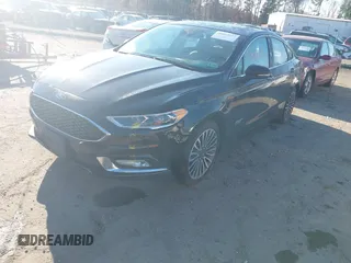 2017 Ford Fusion Titanium with VIN 3FA6P0SU2HR309895, listed as a IAAI auction lot 40963527 with 80,761 mi miles and . Bid and sale history available at DreamBid. Image 17.