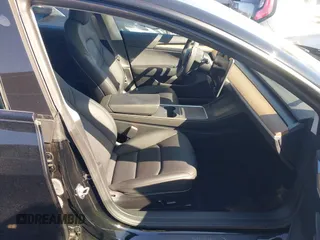 2023 Tesla Model 3 with VIN 5YJ3E1EA2PF482536, listed as a IAAI auction lot 41858110 with 6,298 mi miles. Bid and sale history available at carsss.com. Image 5.