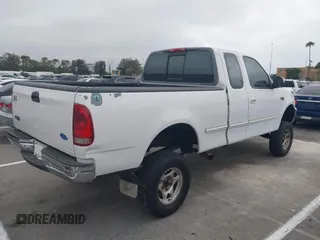 1997 Ford F-150 z VIN 1FTDX17W2VKB82664, wystawiony jako IAAI lot #42554831 z przebiegiem Nie podano mil oraz . Historia ofert i sprzedaży dostępna na DreamBid. Obrazek 4.