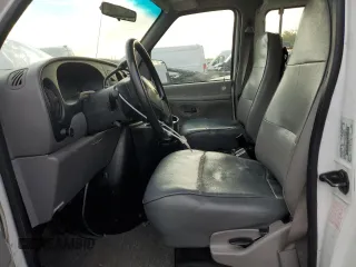 1999 Ford Econoline Passenger XL with VIN 1FBSS31L2XHA95612, listed as a Copart auction lot 72615104 with 211,283 mi miles and Salvage Title. Bid and sale history available at DreamBid. Image 7.