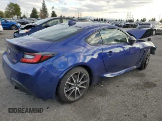 2023 Toyota GR86 with VIN JF1ZNBC11P8764160, listed as a Copart auction lot 89409965 with 12,480 mi miles and Salvage Title. Bid and sale history available at carsss.com. Image 3.