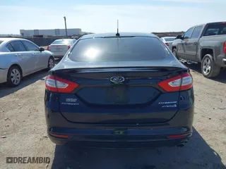 2014 Ford Fusion Titanium Hybrid with VIN 3FA6P0RU9ER111834, listed as a IAAI auction lot 41570337 with 121,099 mi miles. Bid and sale history available at carsss.com. Image 16.