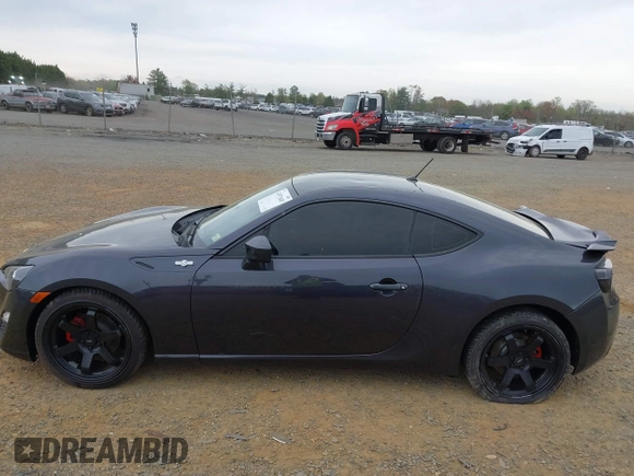 2014 Scion FR-S with VIN JF1ZNAA12E8702261, listed as a IAAI auction lot 41971045 with 124,341 mi miles and . Bid and sale history available at DreamBid. Image 14.