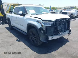 2023 Toyota Tundra Limited Hybrid with VIN 5TFJC5DBXPX037076, listed as a IAAI auction lot 42324604 with 39,900 mi miles and . Bid and sale history available at DreamBid. Image 1.