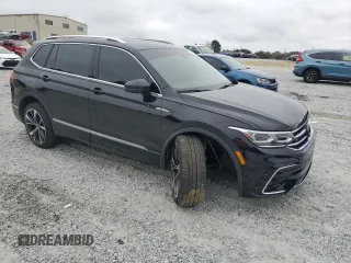 2023 Volkswagen Tiguan SEL R-Line with VIN 3VV4B7AX6PM020956, listed as a Copart auction lot 79680384 with 31,220 mi miles and Salvage title. Bid and sale history available at DreamBid. Image 4.
