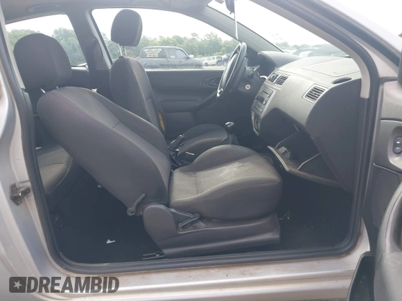 2006 Ford Focus S z VIN 1FAFP31NX6W160335, wystawiony jako IAAI lot #42377929 z przebiegiem 190 901 mil mil oraz . Historia ofert i sprzedaży dostępna na DreamBid. Obrazek 5.