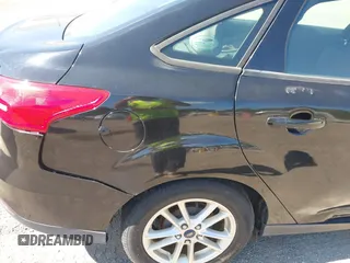 2016 Ford Focus SE with VIN 1FADP3F23GL235708, listed as a IAAI auction lot 42629556 with 139,777 mi miles and . Bid and sale history available at DreamBid. Image 15.
