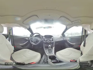 2018 Ford Focus Titanium z VIN 1FADP3N21JL295883, wystawiony jako Copart lot #59051015 z przebiegiem 43 284 mil mil oraz Szkoda całkowita • Salvage title. Historia ofert i sprzedaży dostępna na DreamBid. Obrazek 14.