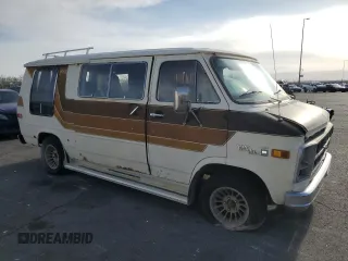 1979 GMC Vandura z VIN TGR2597506100, wystawiony jako Copart lot #51086615 z przebiegiem 25 002 mil mil oraz Tytuł czysty. Historia ofert i sprzedaży dostępna na DreamBid. Obrazek 4.