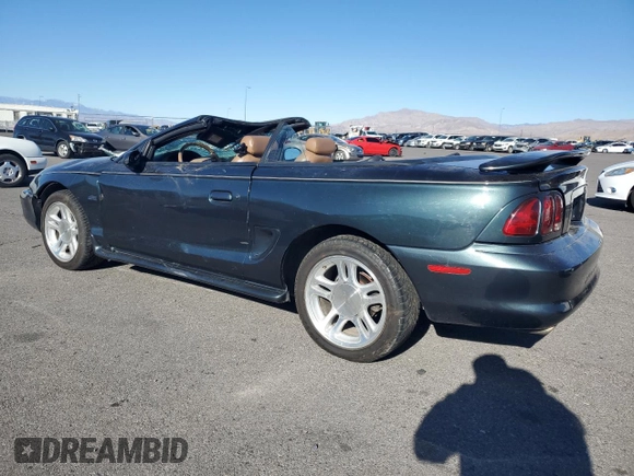 1998 Ford Mustang GT with VIN 1FAFP45X4WF216691, listed as a Copart auction lot 79389084 with 101,980 mi miles and Salvage Title. Bid and sale history available at carsss.com. Image 2.