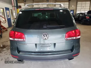 2004 Volkswagen Touareg z VIN WVGCM67L94D032492, wystawiony jako Copart lot #72205044 z przebiegiem 98 482 mil mil oraz Tytuł czysty. Historia ofert i sprzedaży dostępna na DreamBid. Obrazek 6.