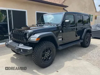 2023 Jeep Wrangler Sahara with VIN 1C4JJXP65PW627241, listed as a Copart auction lot 55661585 with 9,282 mi miles and Clean Title. Bid and sale history available at DreamBid. Image 2.